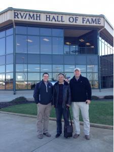 Robert (Left) Todd Wager (far right) with a lumbercore supplier visiting the RV hall of fame in Elkhart, IN